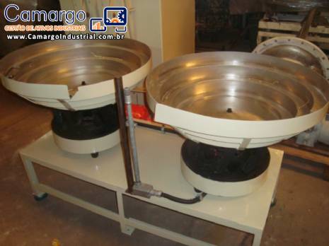 Posicionador para alimentador vibrat�rio de tempo duplo